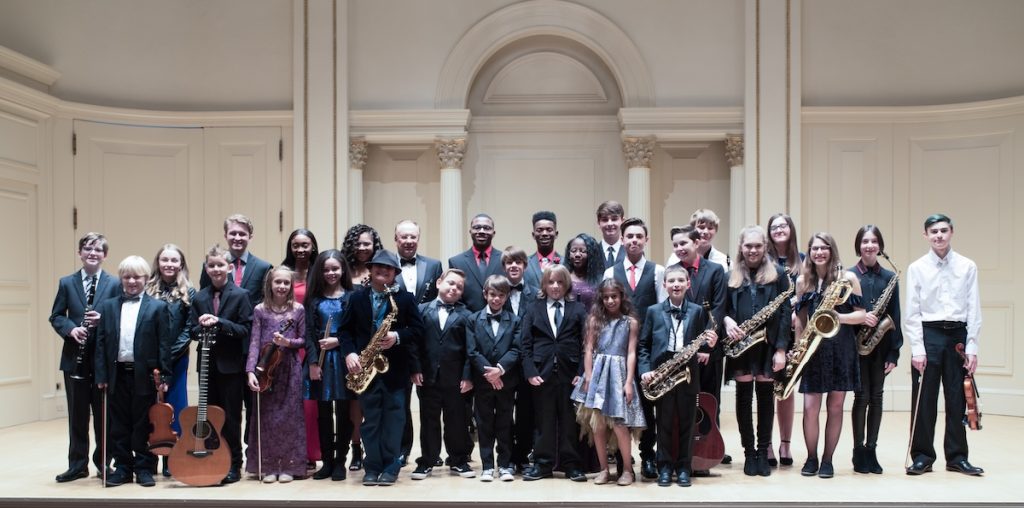 Morris Music Academy students from Jacksonville Beach performing in Carnegie Hall recital.